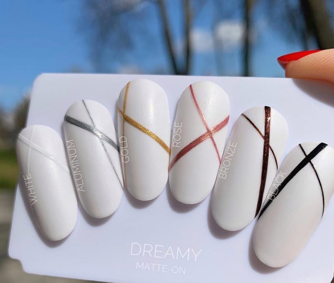 Akzentz Gel-Play Line-It fine line-art samples on white nail tips