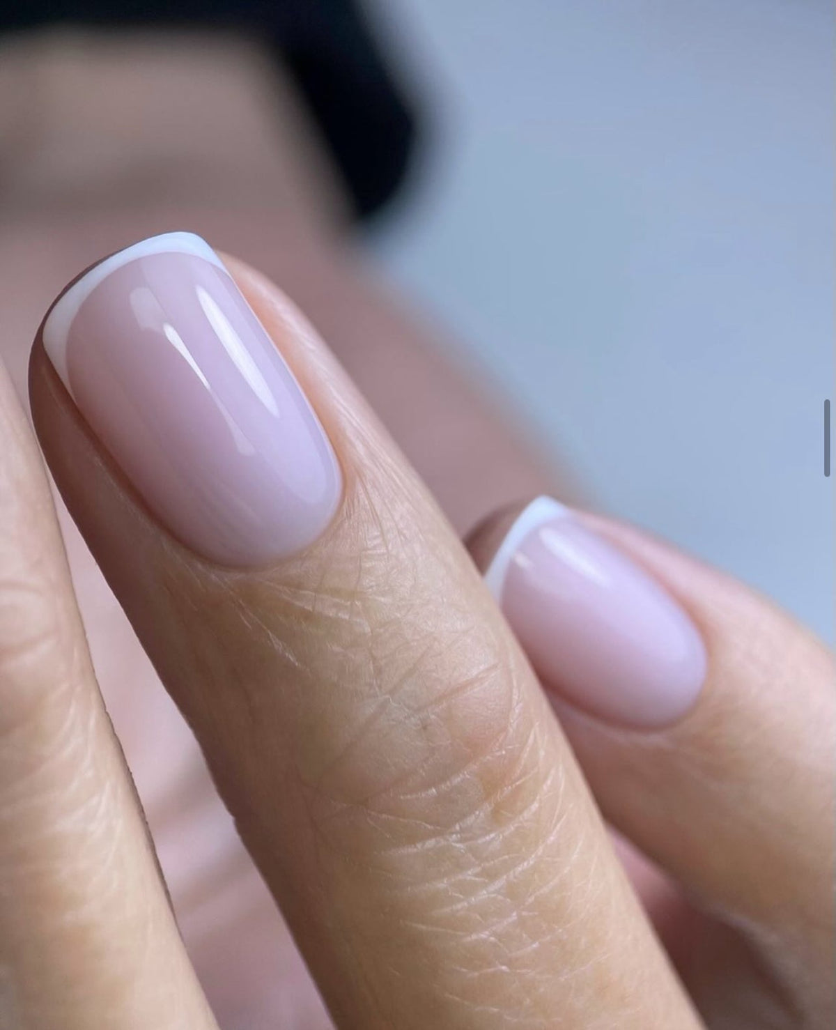Soft white manicure created with Akzentz Gel-Play Paint Titanium White