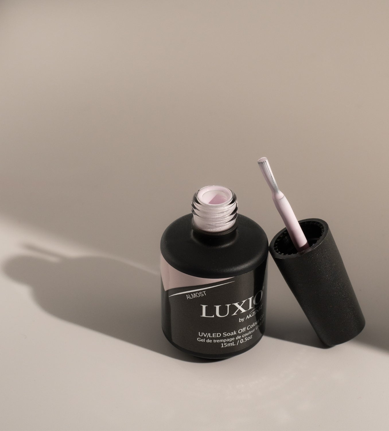 Open Akzentz Luxio Almost 15 mL gel bottle and brush