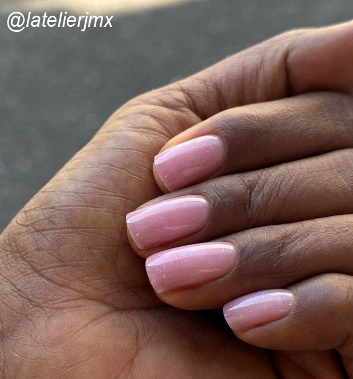 Manicure finished with Luxio Build Sparkles Kiss
