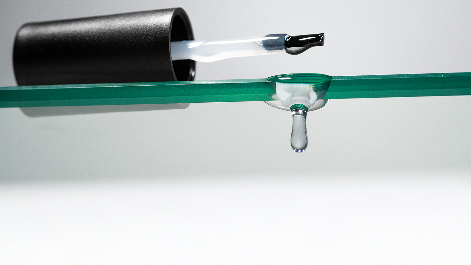 Akzentz Prescription Base X-Bond gel brush and drop on glass shelf