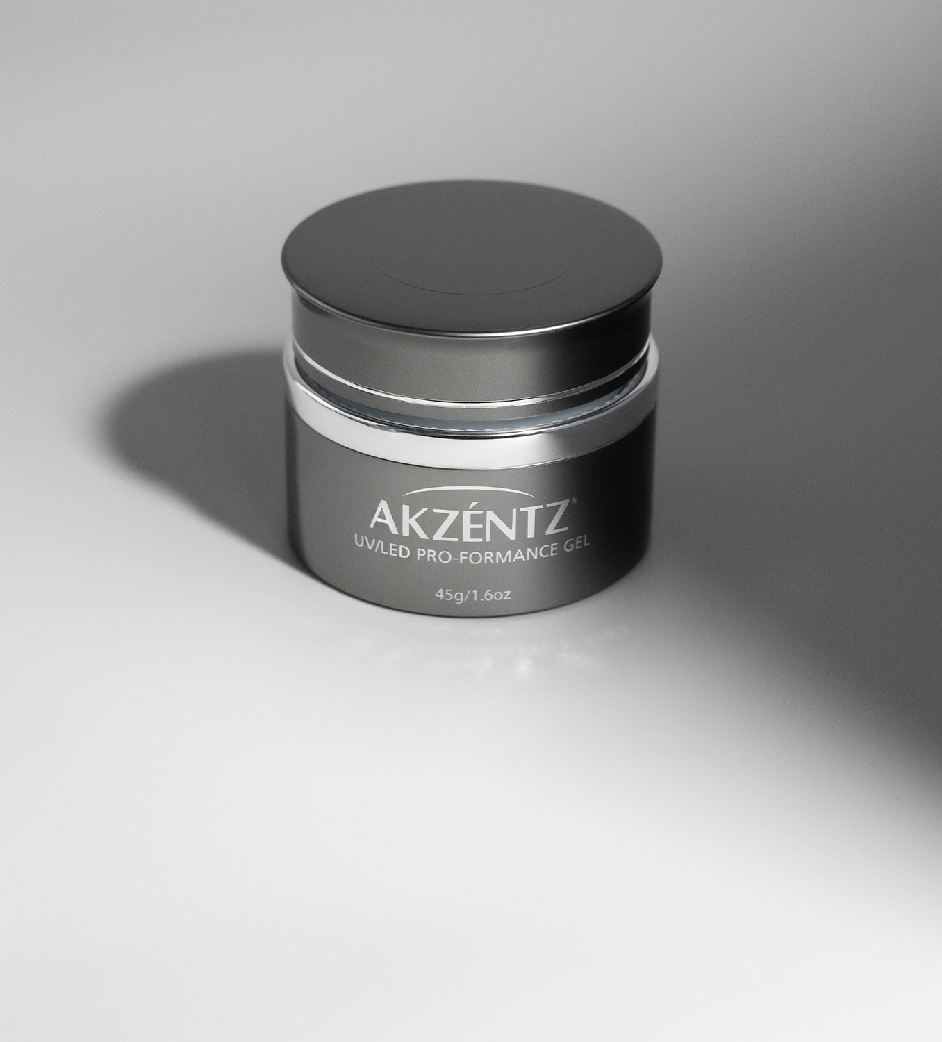 Akzentz Pro-Formance hard gel jar on a neutral studio background