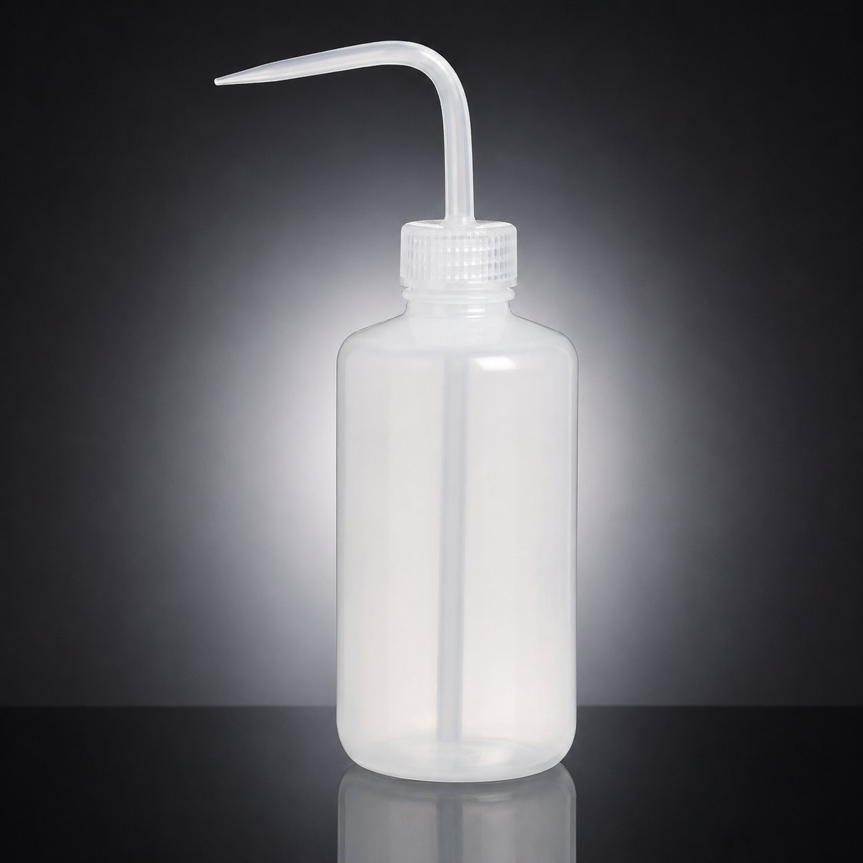 A translucent white plastic wash bottle with a curved, angled pipette-style spout, shown on a reflective black surface against a dark gray gradient background.