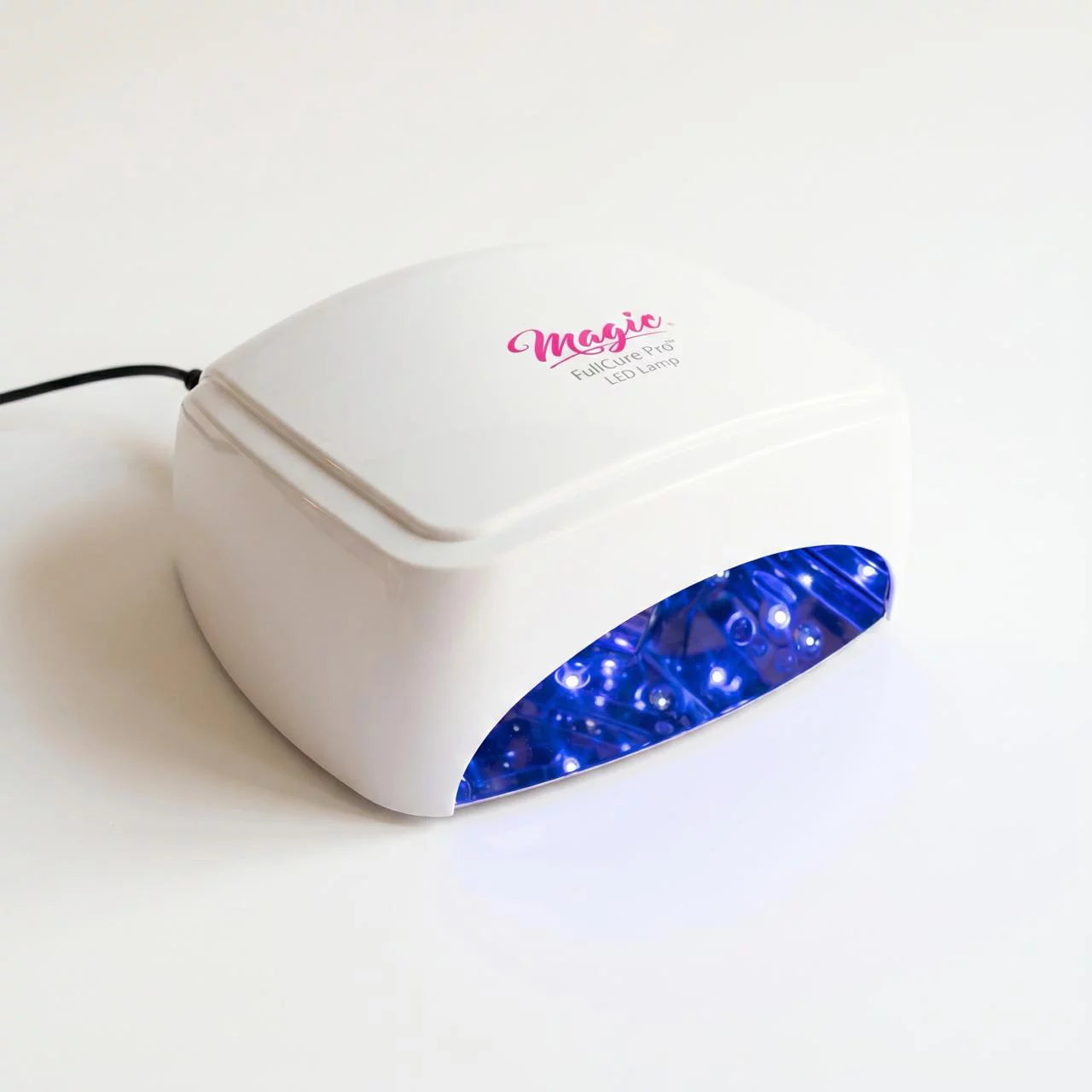 White nail dryer with blue light on a white background