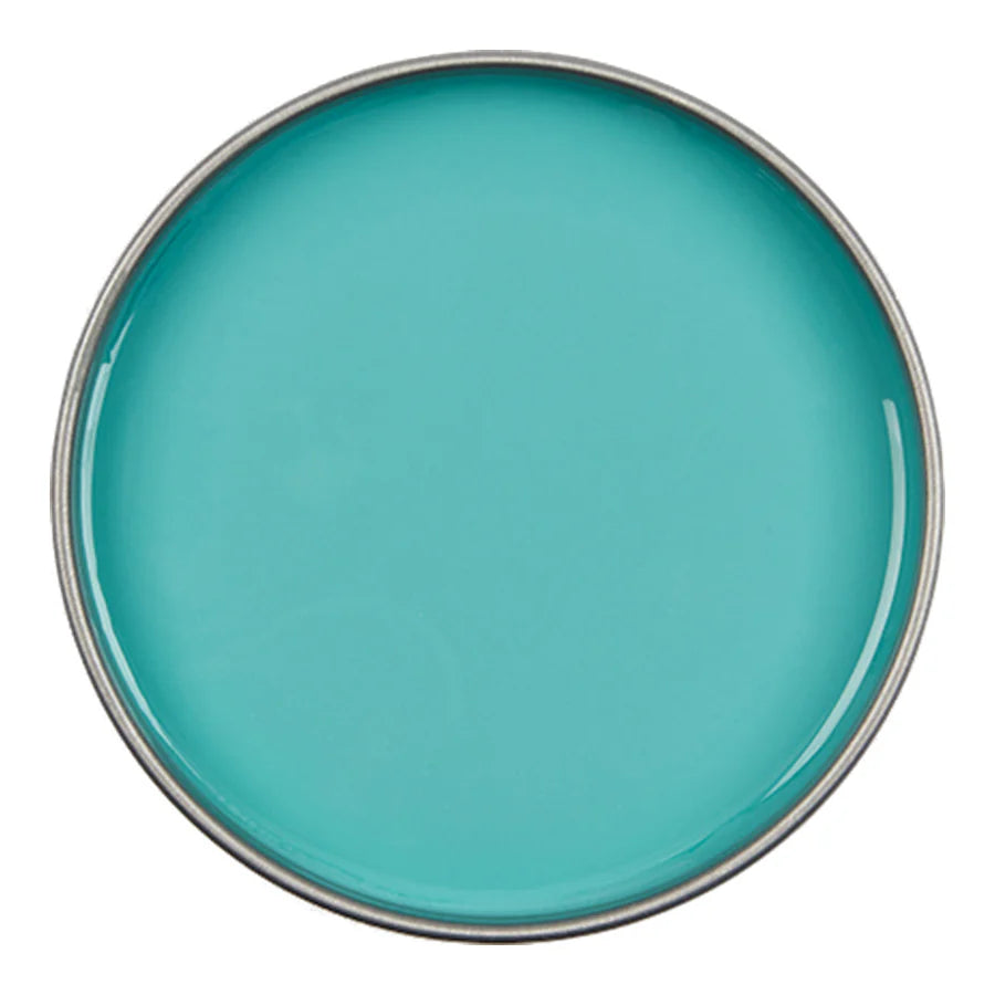 A round turquoise blue plate with a thin silver rim, shown from a top-down view on a white background.