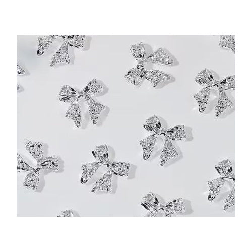 Coconoir Beauty Nail Charms Silvery Bows 25pk nail art charms and embellishments
