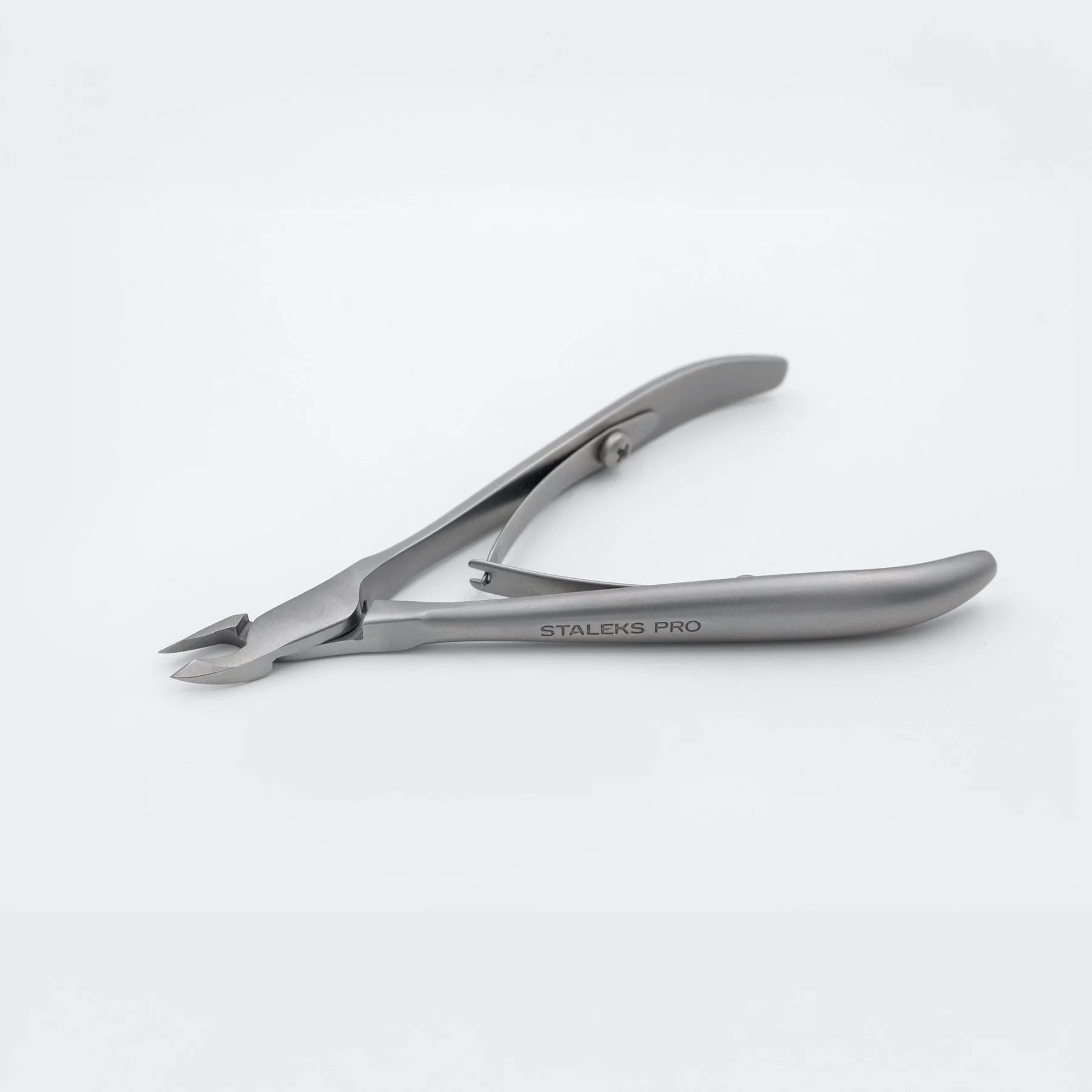 Nail clipper with 'Staleks Pro' branding on a white background