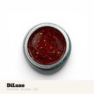 Red glittery gel in a silver container with 'DiLuxe' branding on a white background