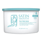 A white plastic tub of Satin Smooth Tea Tree Wax with a light teal lid and matching teal text and graphics on the front, set against a plain white background.