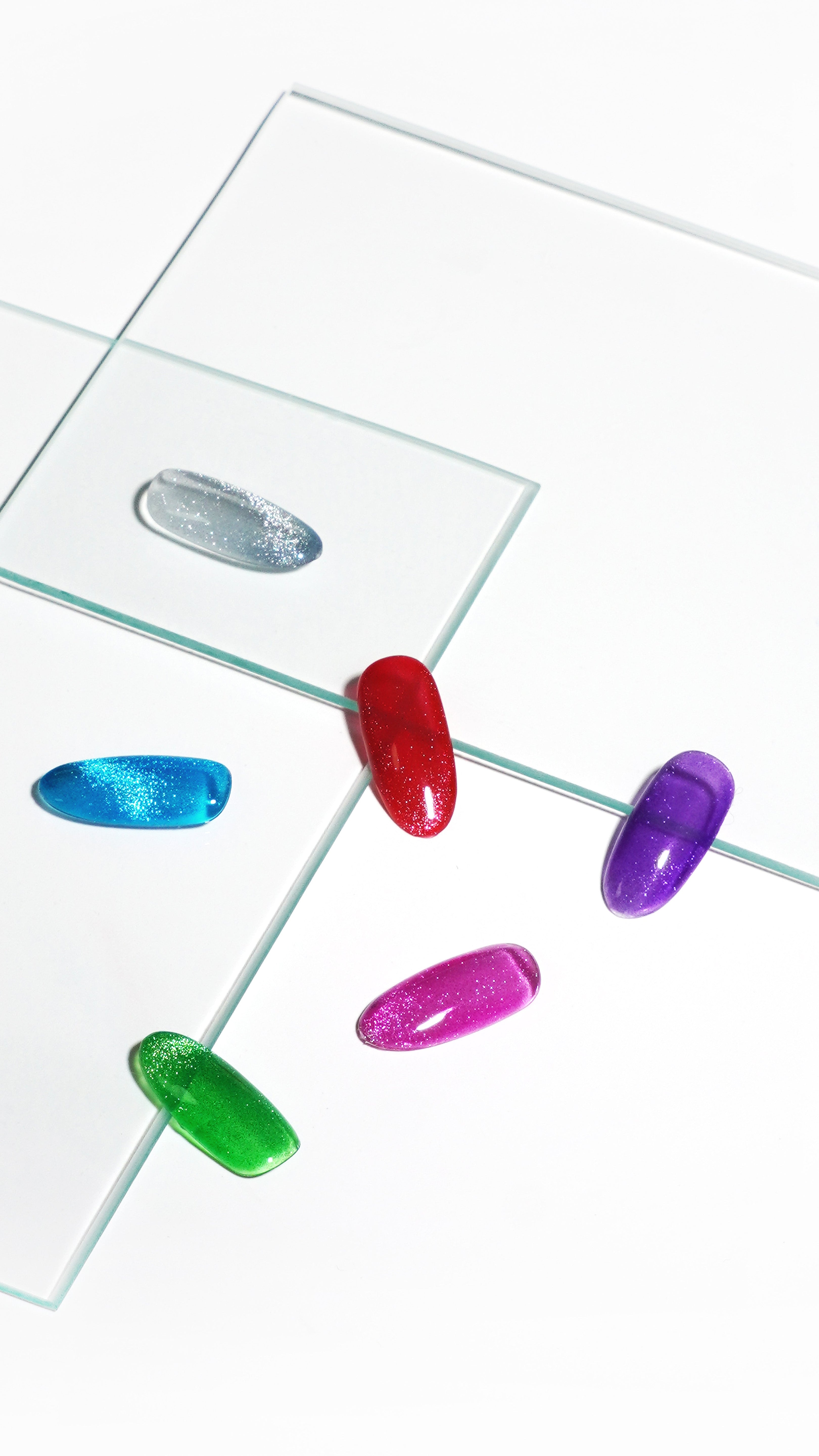 Akzentz Gel-Play Magnetic Clear Silver layered over assorted colors