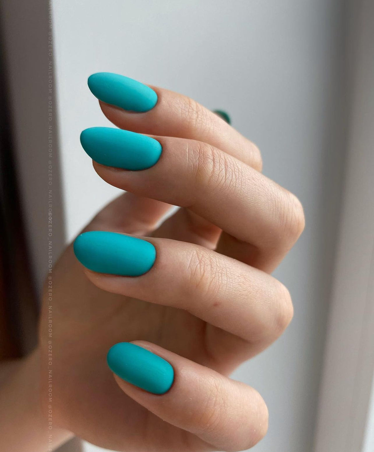 Akzentz Luxio Brazen gel polish shown on manicured nails