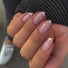Manicure with Akzentz Luxio Rose Gold glitter accent nails