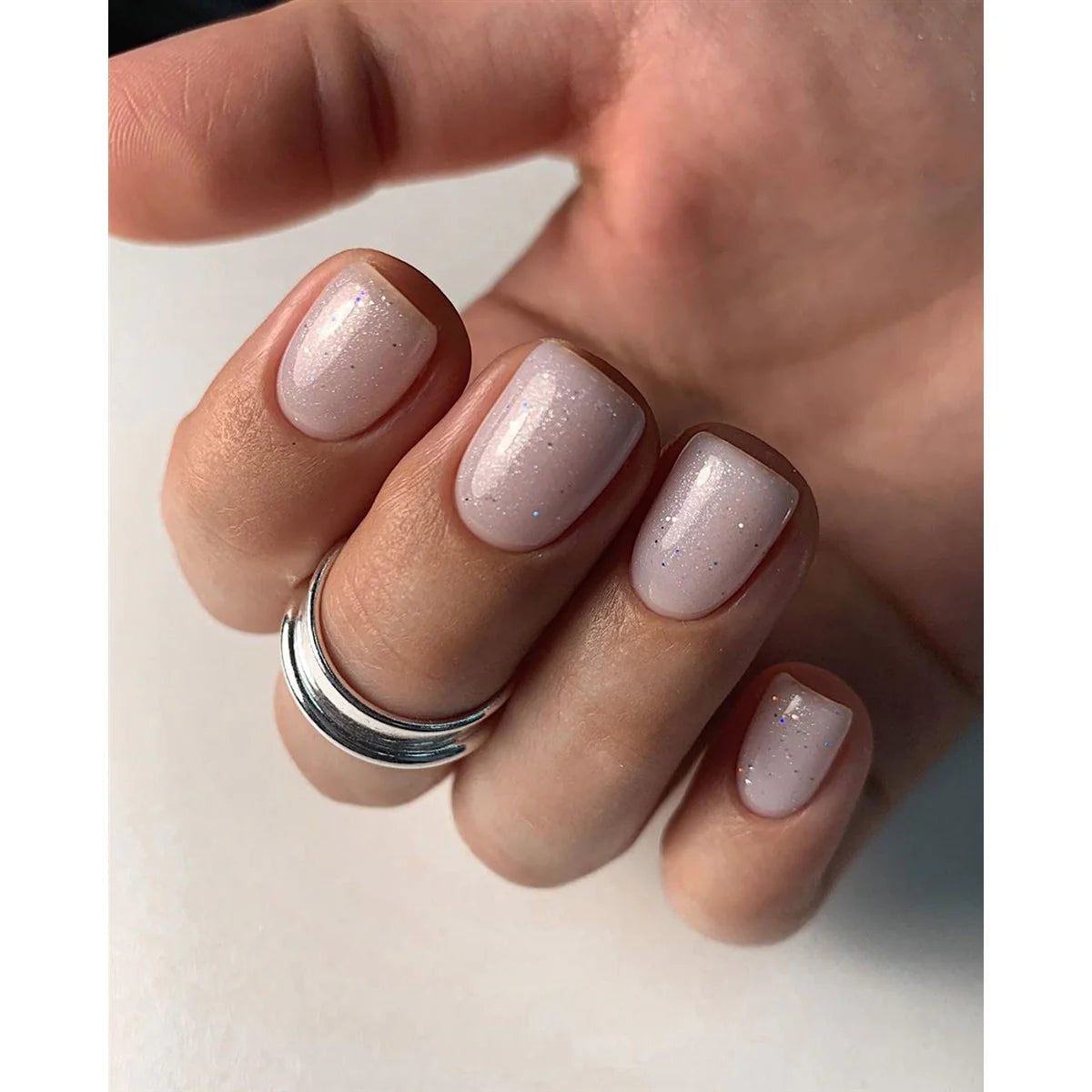 Manicure with Akzentz Luxio Stardust sheer shimmer gel