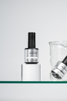 Akzentz Prescription Base Super-Bond 15ml bottle with laboratory glassware