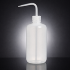 A translucent white plastic wash bottle with a long, curved pipette-style spout, shown on a dark gray gradient background with a soft reflection below.