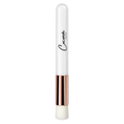 Coconoir Beauty white lash cleansing brush with rose gold ferrule and soft white bristles
