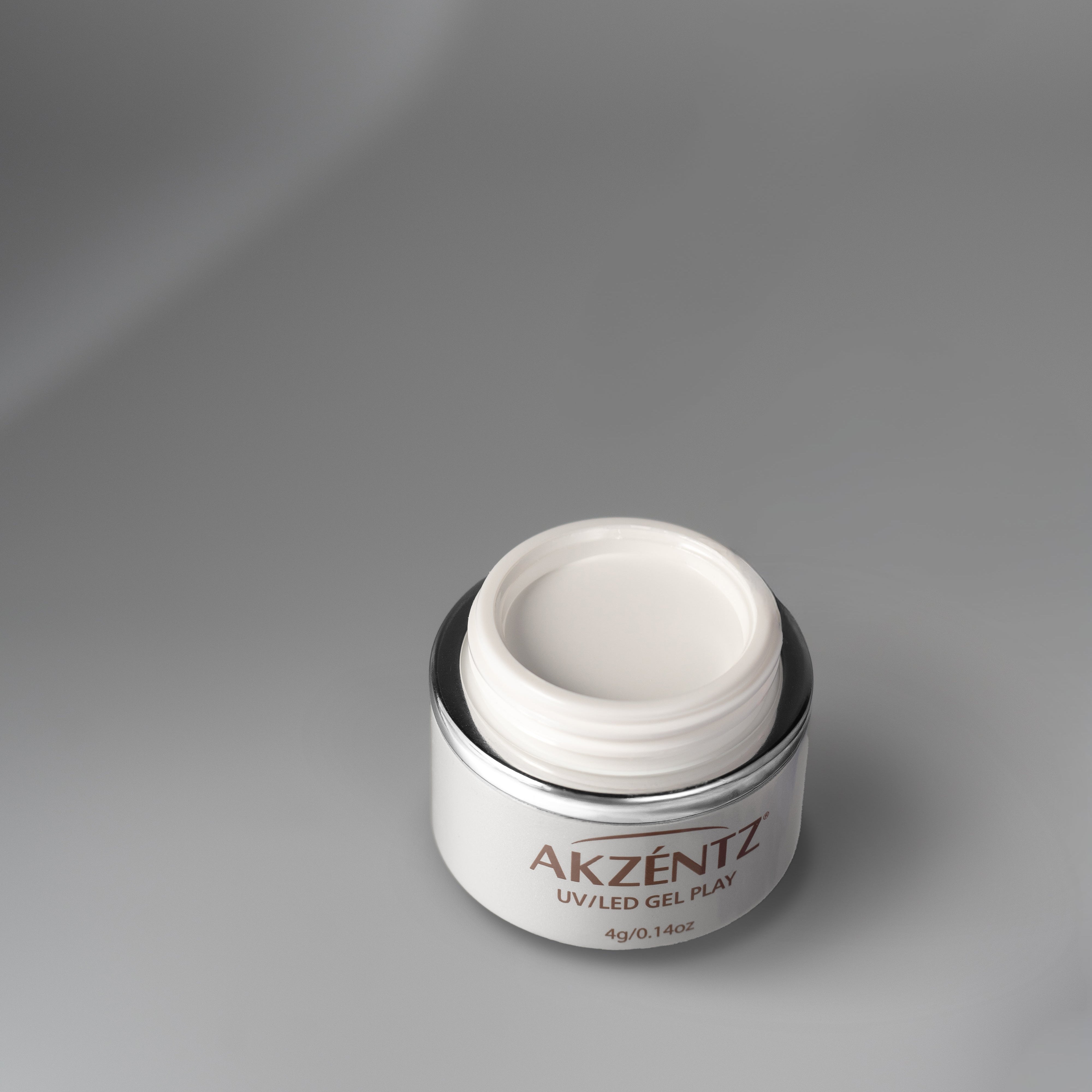 Open 4g jar of Akzentz Gel Play Perfect French White art gel.