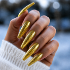 BEMI Solar Flakes Chrome shown on long coffin nails