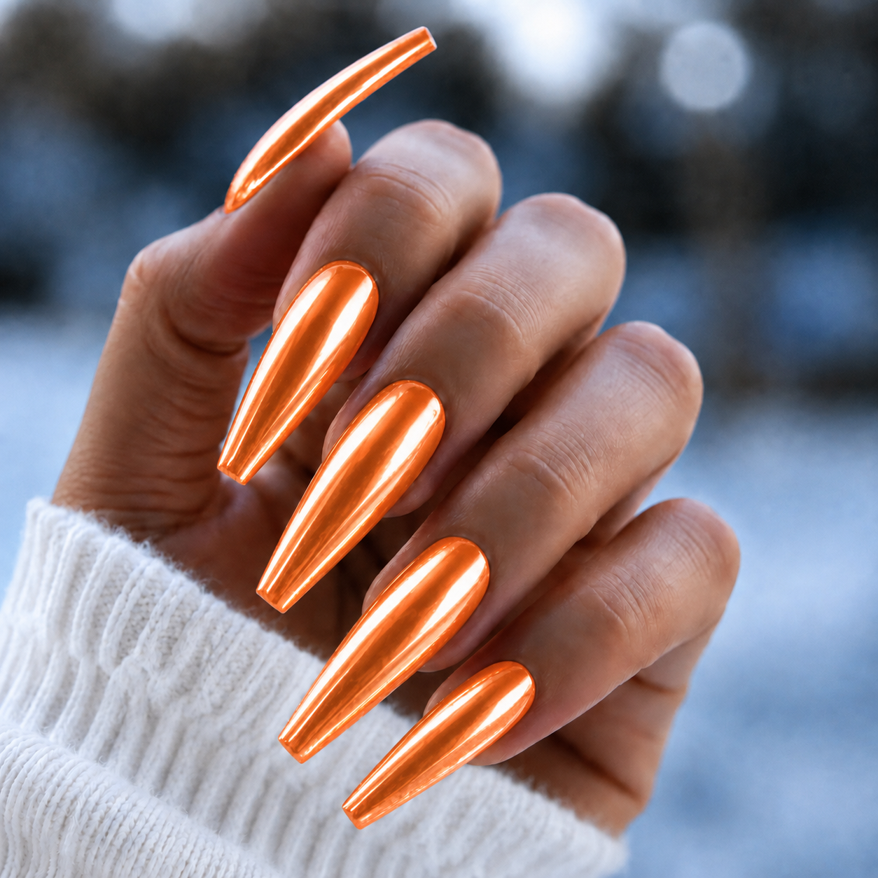 BEMI Neo Orange Chrome shown on long coffin nails