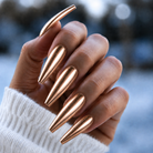 BEMI Rose Gold Chrome shown on long coffin nails