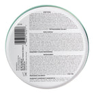 Back label of a cosmetic product with text and a barcode on a white background