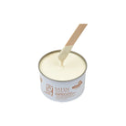 Jar of satin smooth hair wax with a wooden applicator on a white background