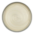 Round ceramic plate with a textured surface on a white background