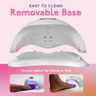 Gel nail dryer with removable base on a pink background