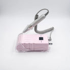 A pink electronic nail drill machine with a clear protective case, a gray coiled cord, and a gray handheld drill bit wand, shown on a white background.