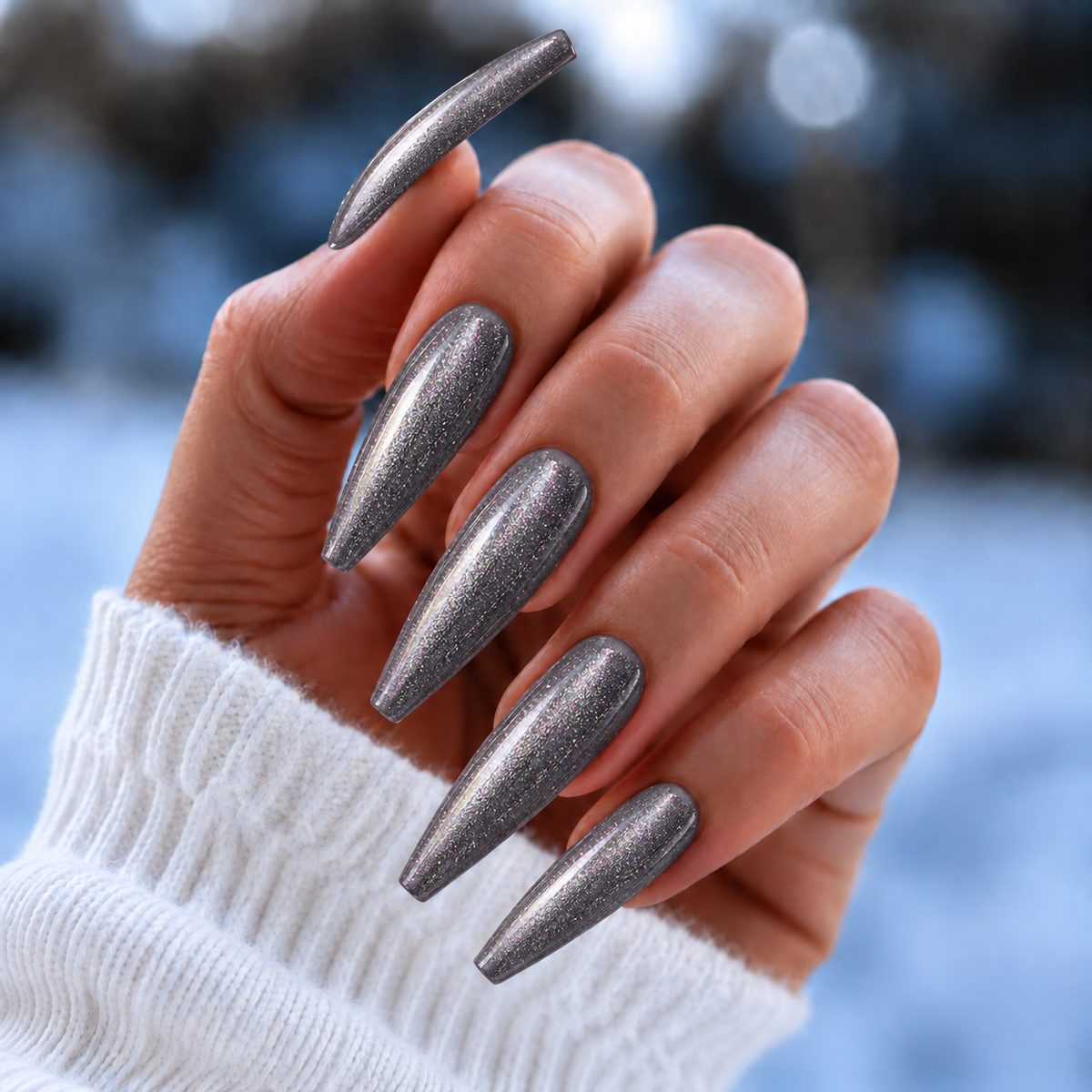 BEMI Cat Eye Celestial nails in a color photo.