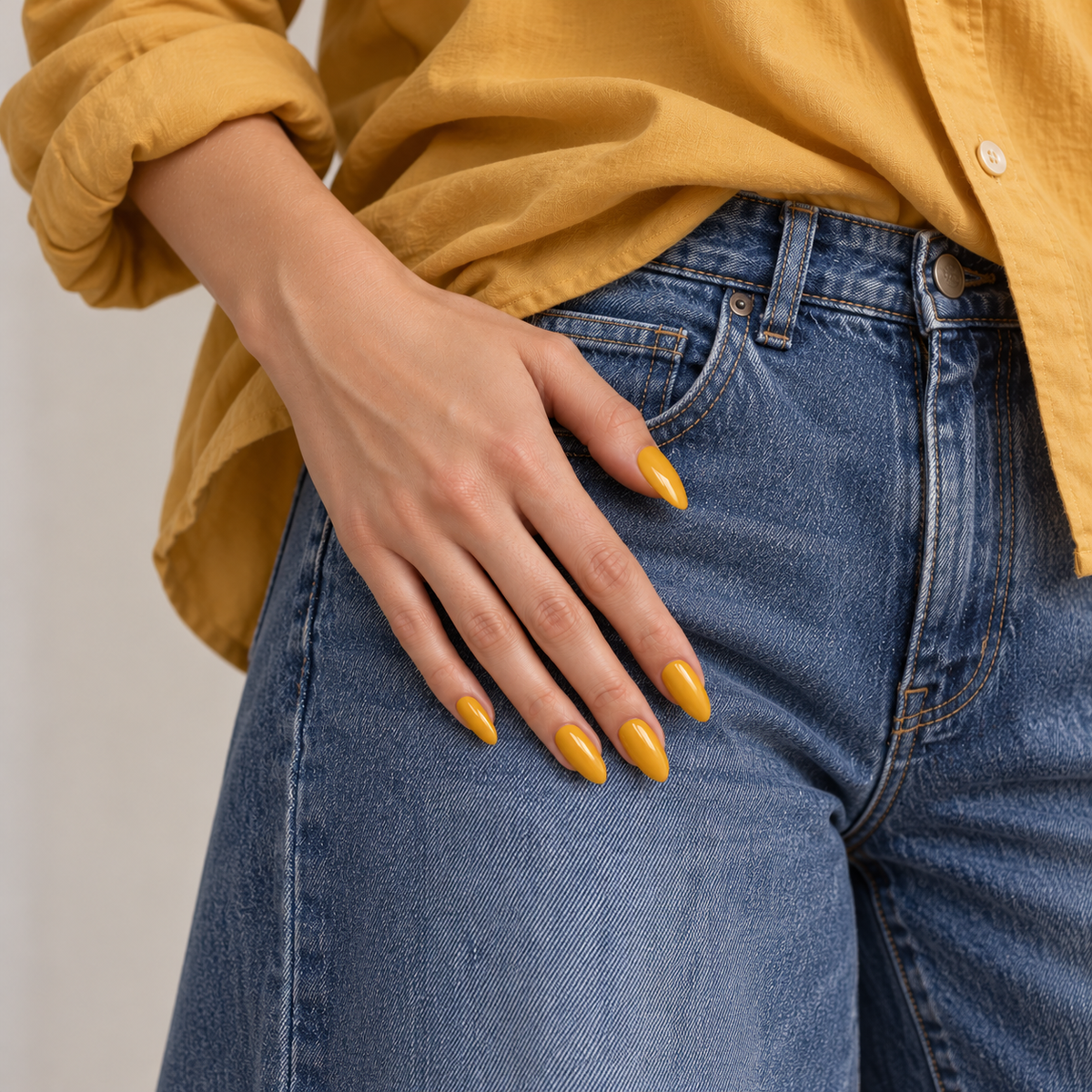 BEMI Creami Marigold O22 nails in a Wear it photo.