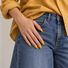 BEMI Creami Marigold O22 nails in a Wear it photo.