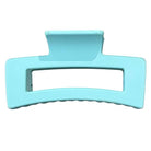 A light blue hair claw clip shown from the front on a solid white background.