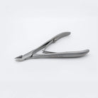 Nail clipper with 'Staleks Pro' branding on a white background